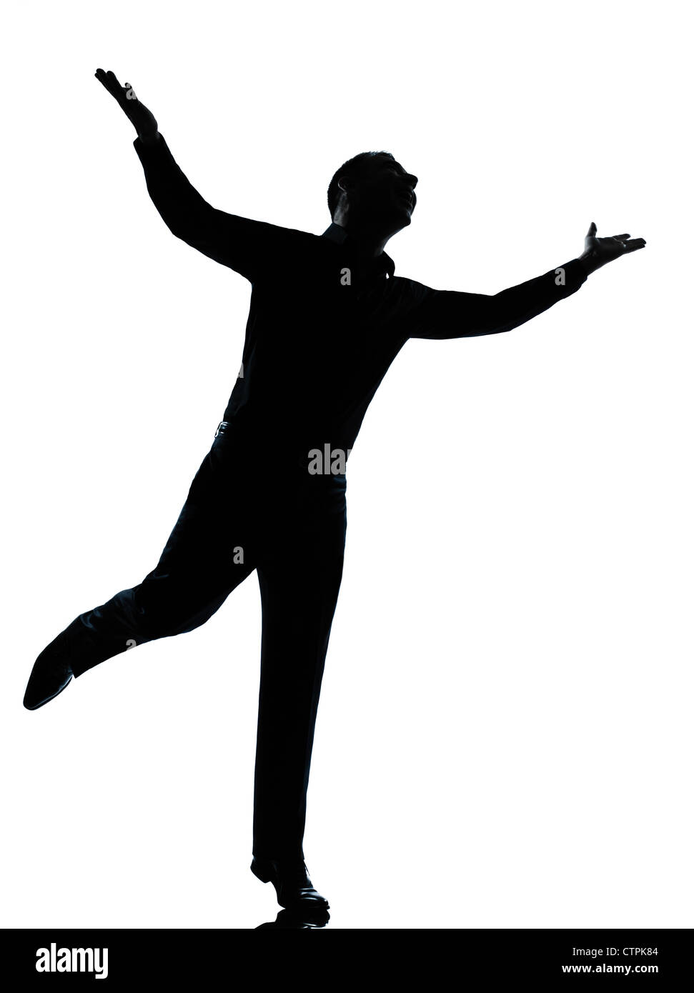 Un caucasian business homme heureux se propager dans toute la longueur des bras silhouette studio isolé sur fond blanc Banque D'Images