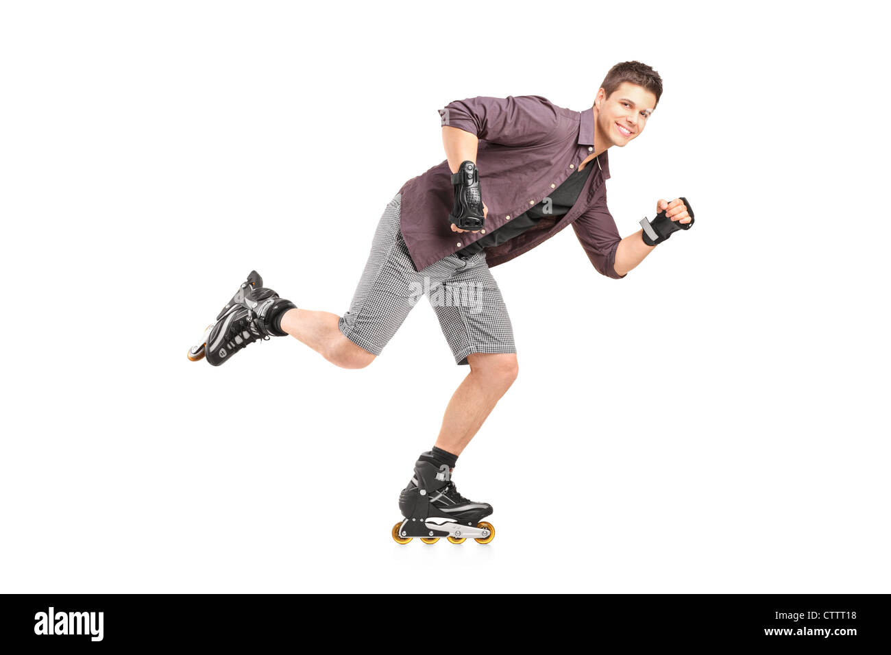 Man roller skating Banque d'images détourées - Alamy
