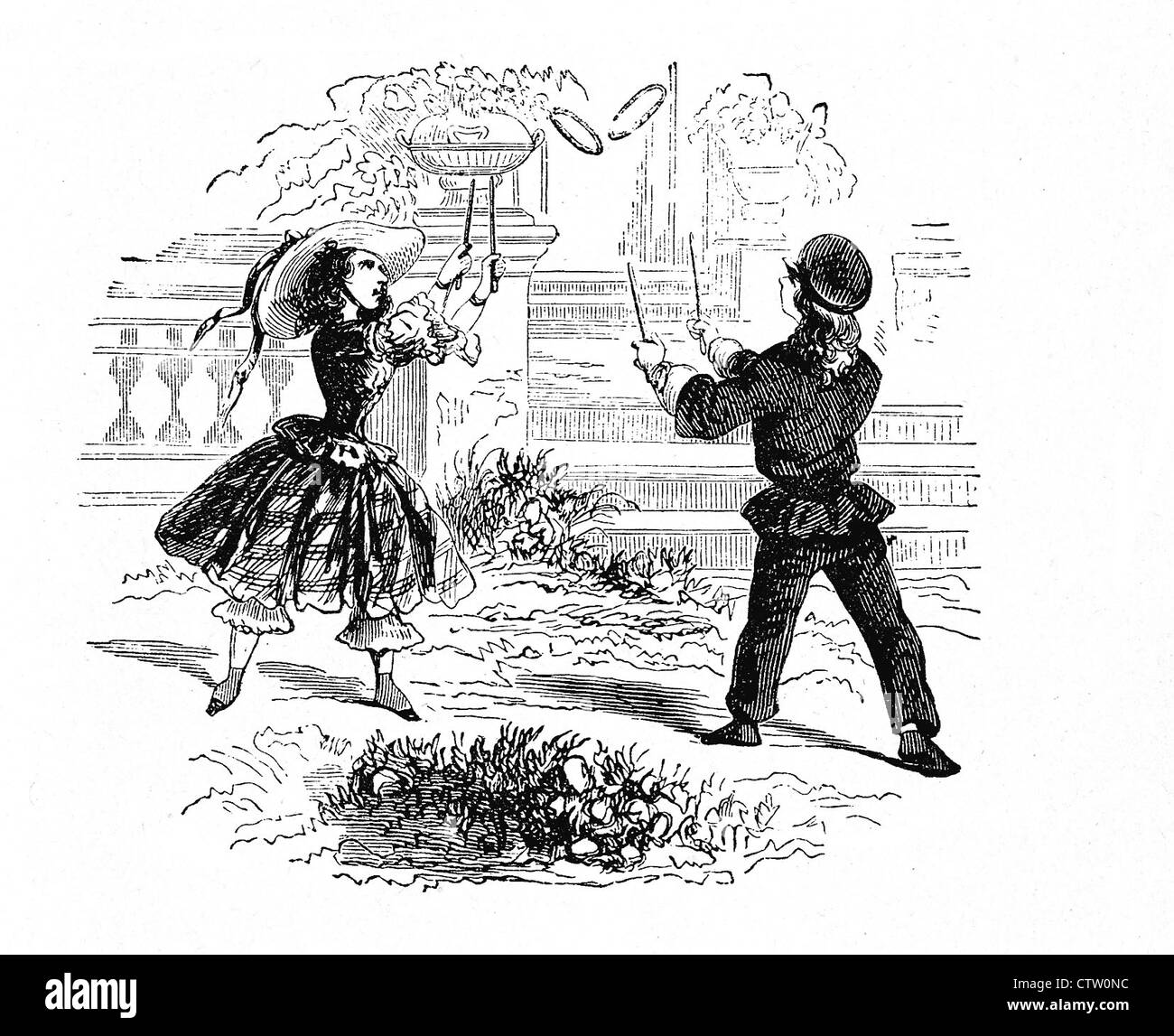 Vintage noir et blanc illustration : fille et garçon jouant de la piscine jeu de cercles dans le jardin Banque D'Images