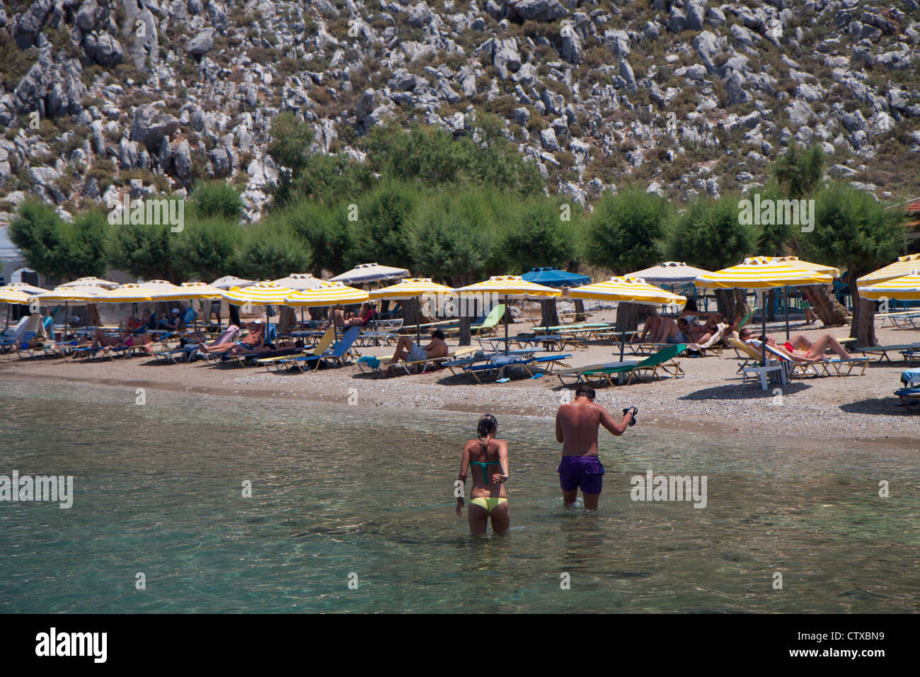 La baie de Pedi Symi Grèce Banque D'Images