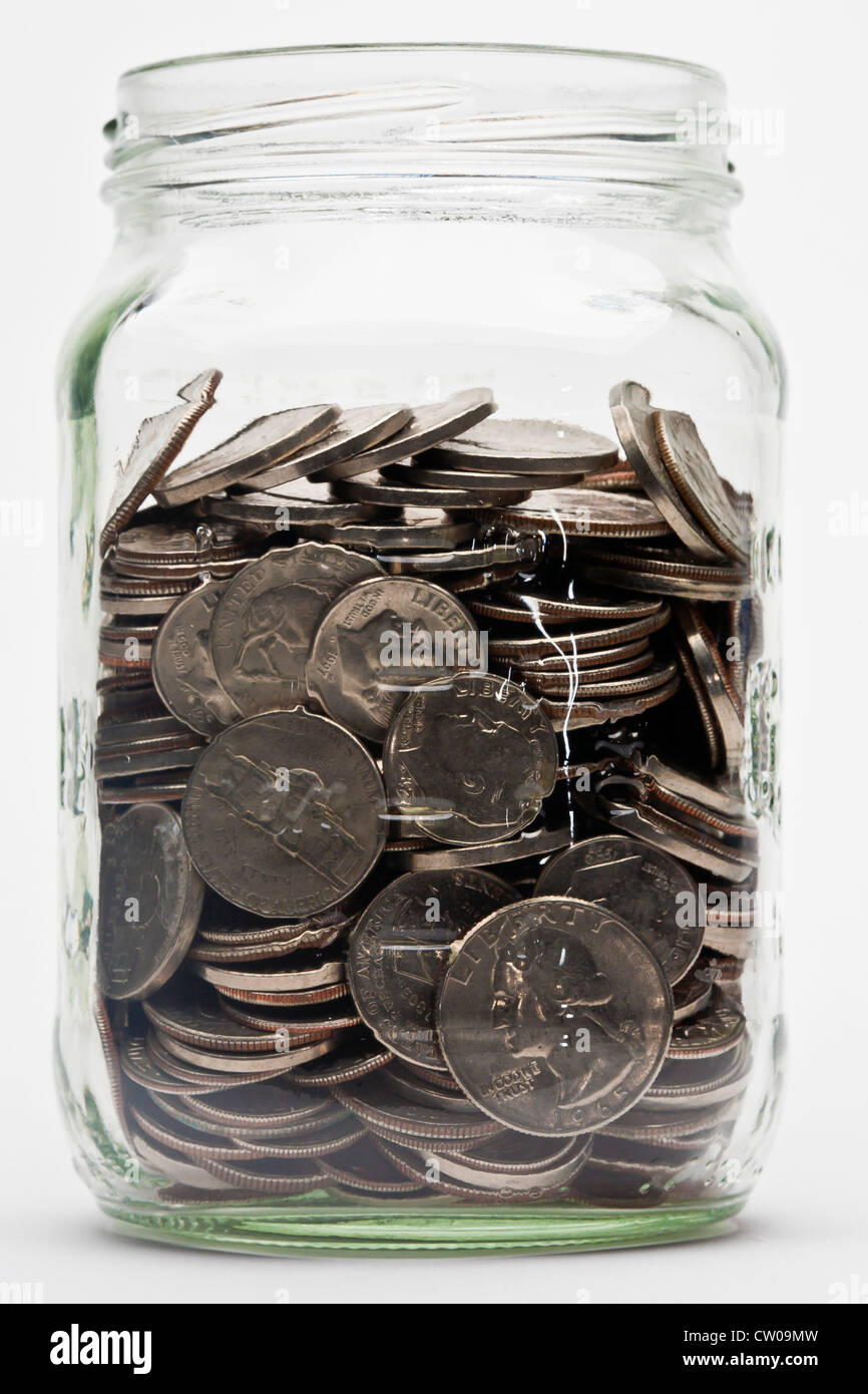 Pot de us coins en dix sous, nickles, et quartiers Banque D'Images