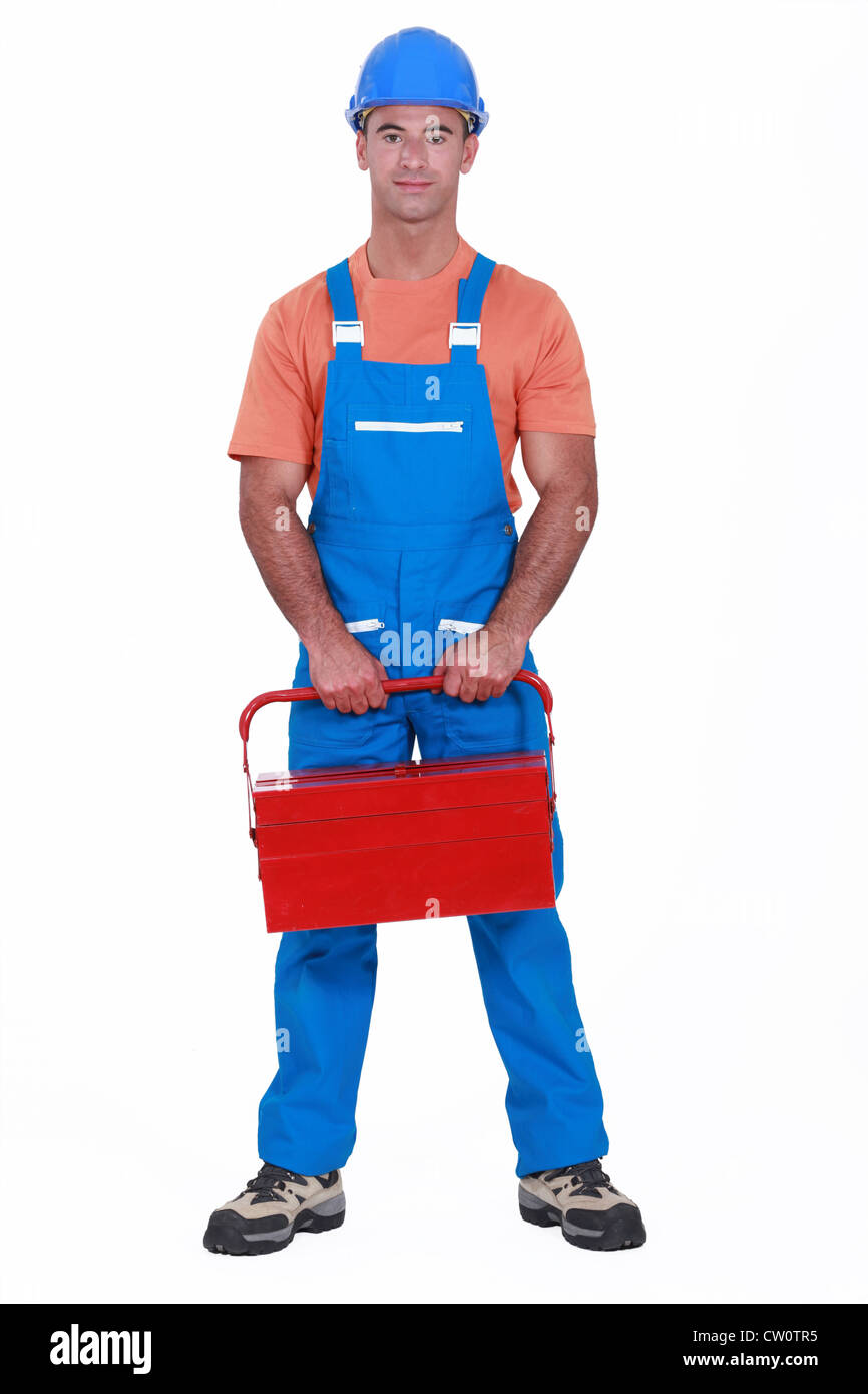 Man holding boite à outils rouge Banque D'Images