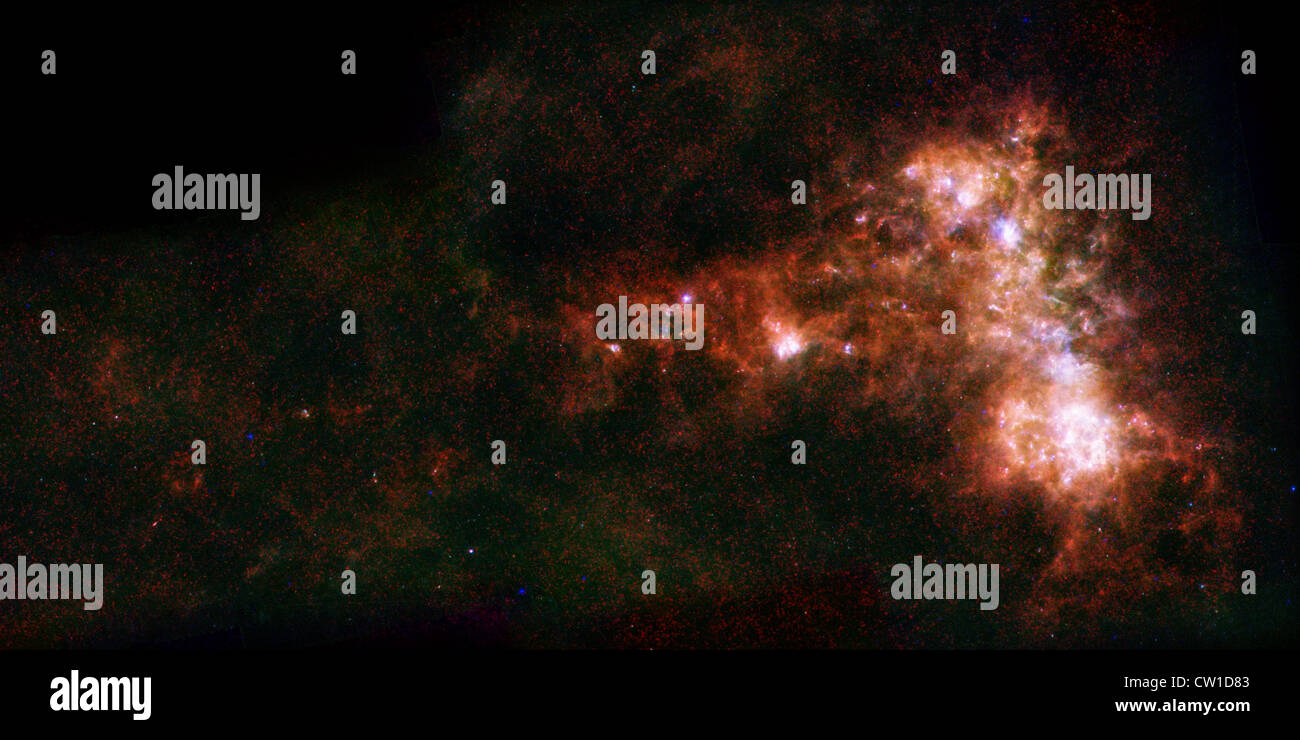La formation des étoiles dans une galaxie naine Petit Nuage de Magellan Galaxie dans la lumière infrarouge de l'observatoire spatial Herschel Banque D'Images