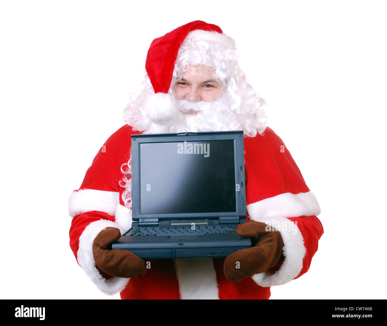 Le Père Noël est de présenter un ordinateur portable Banque D'Images