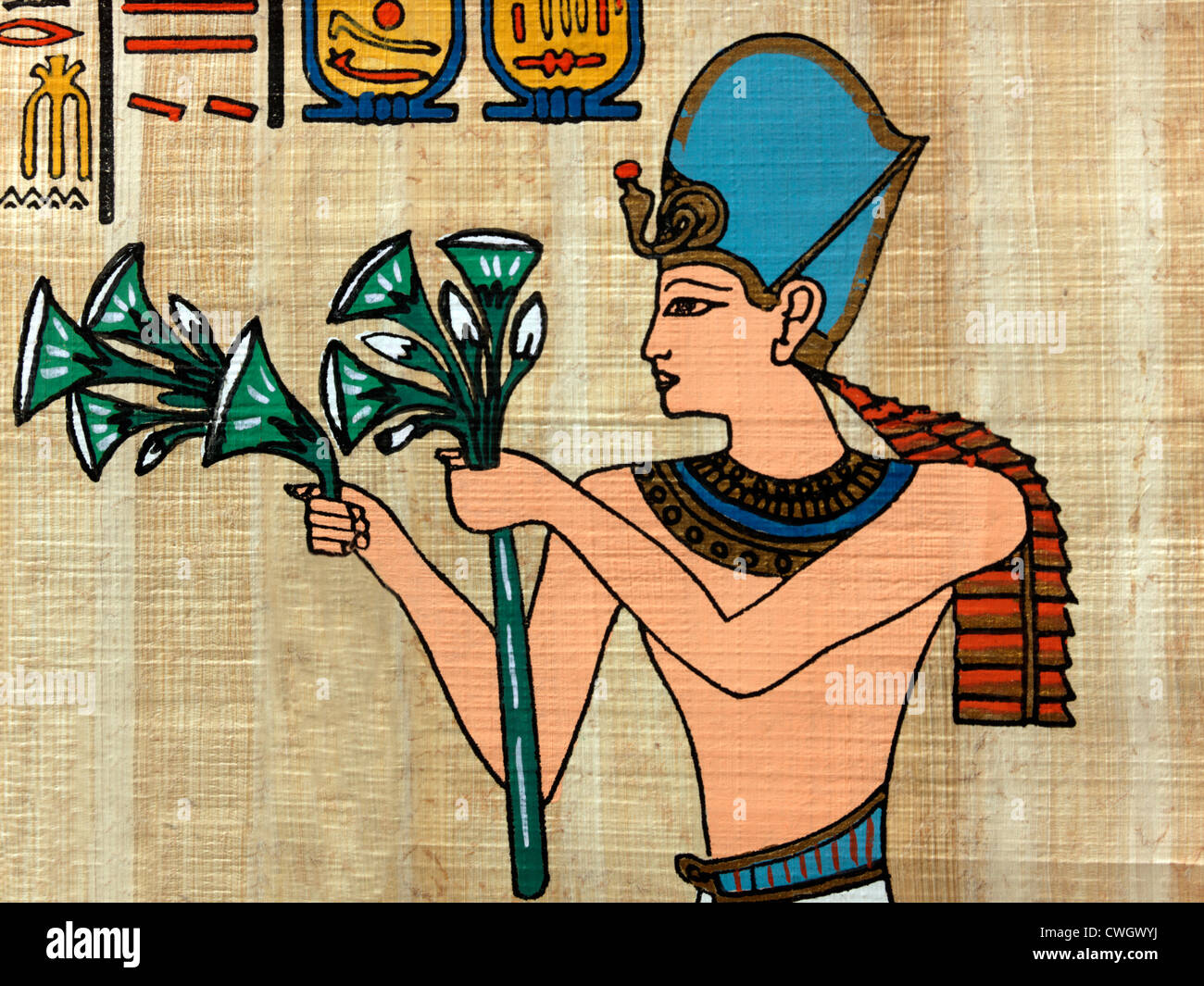 Peinture de papyrus égyptien Ramsès II offrant des fleurs de lotus Banque D'Images