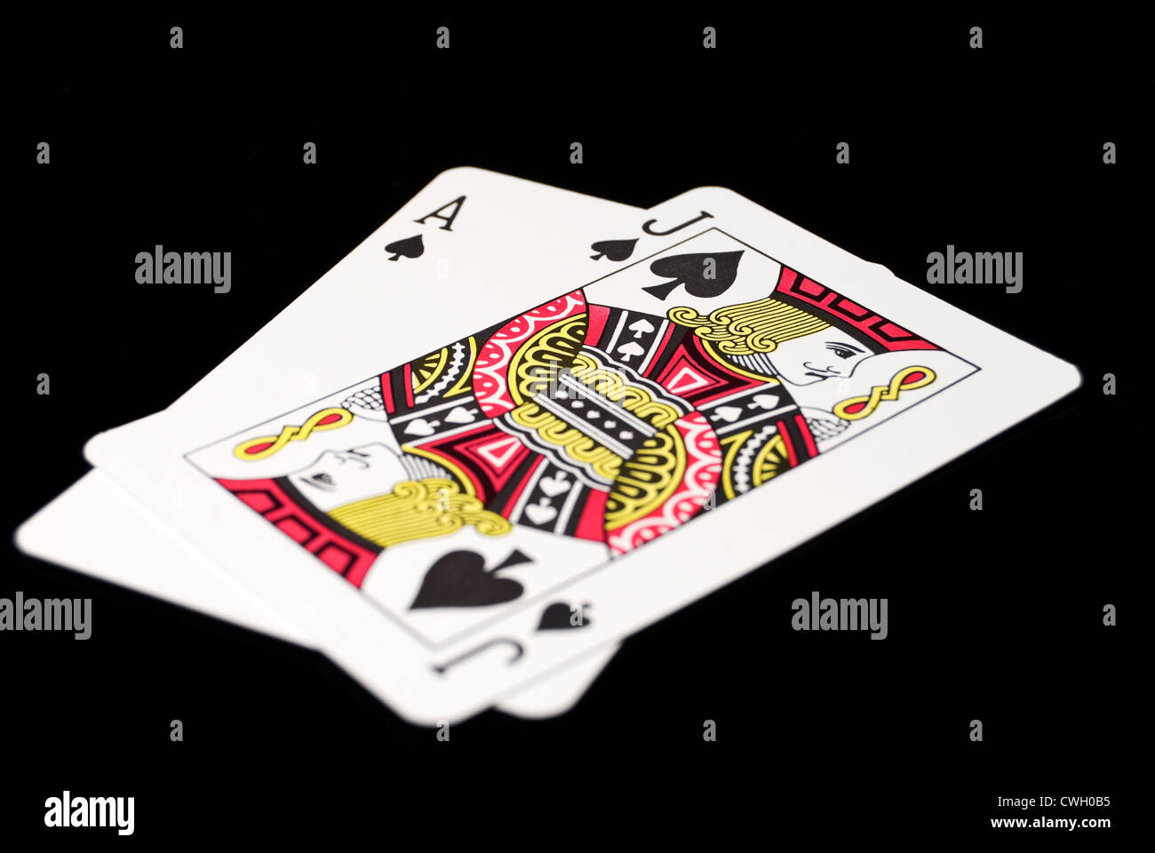 Cartes de Blackjack sur fond noir Banque D'Images