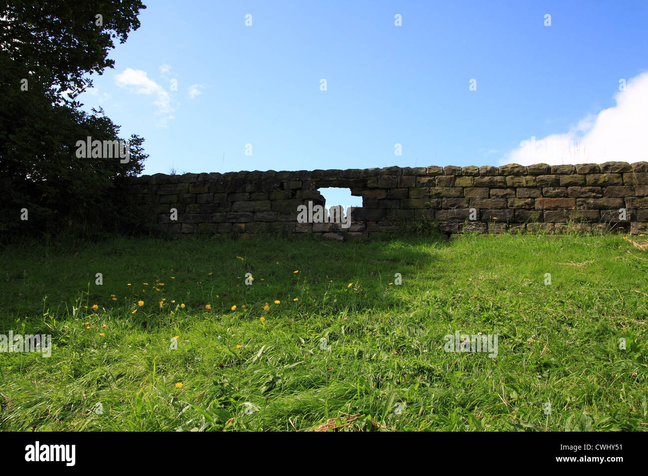Trou dans le mur Banque D'Images