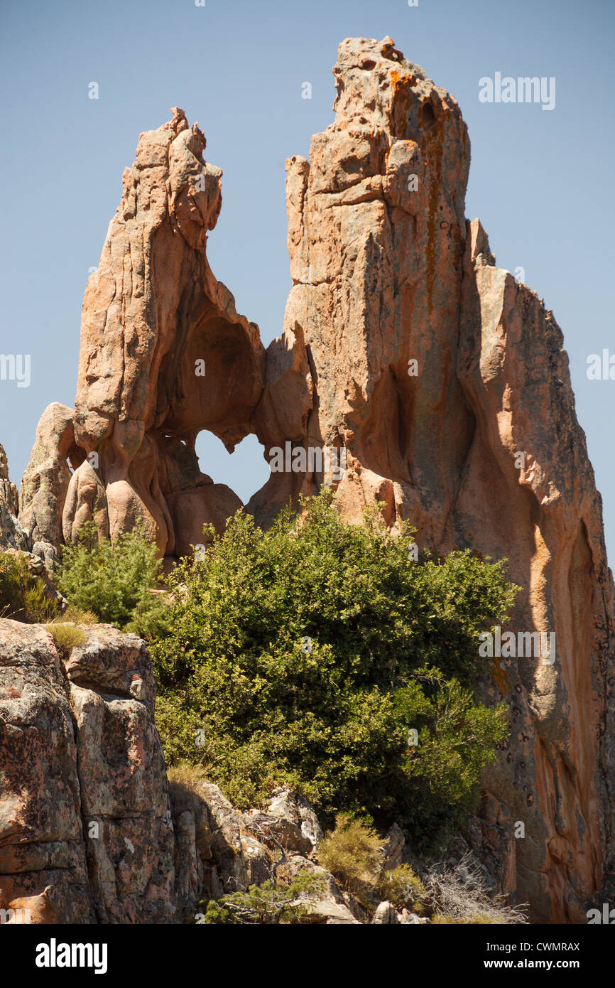 Trou dans la roche en forme de coeur calanche de Piana, Corse, France Banque D'Images