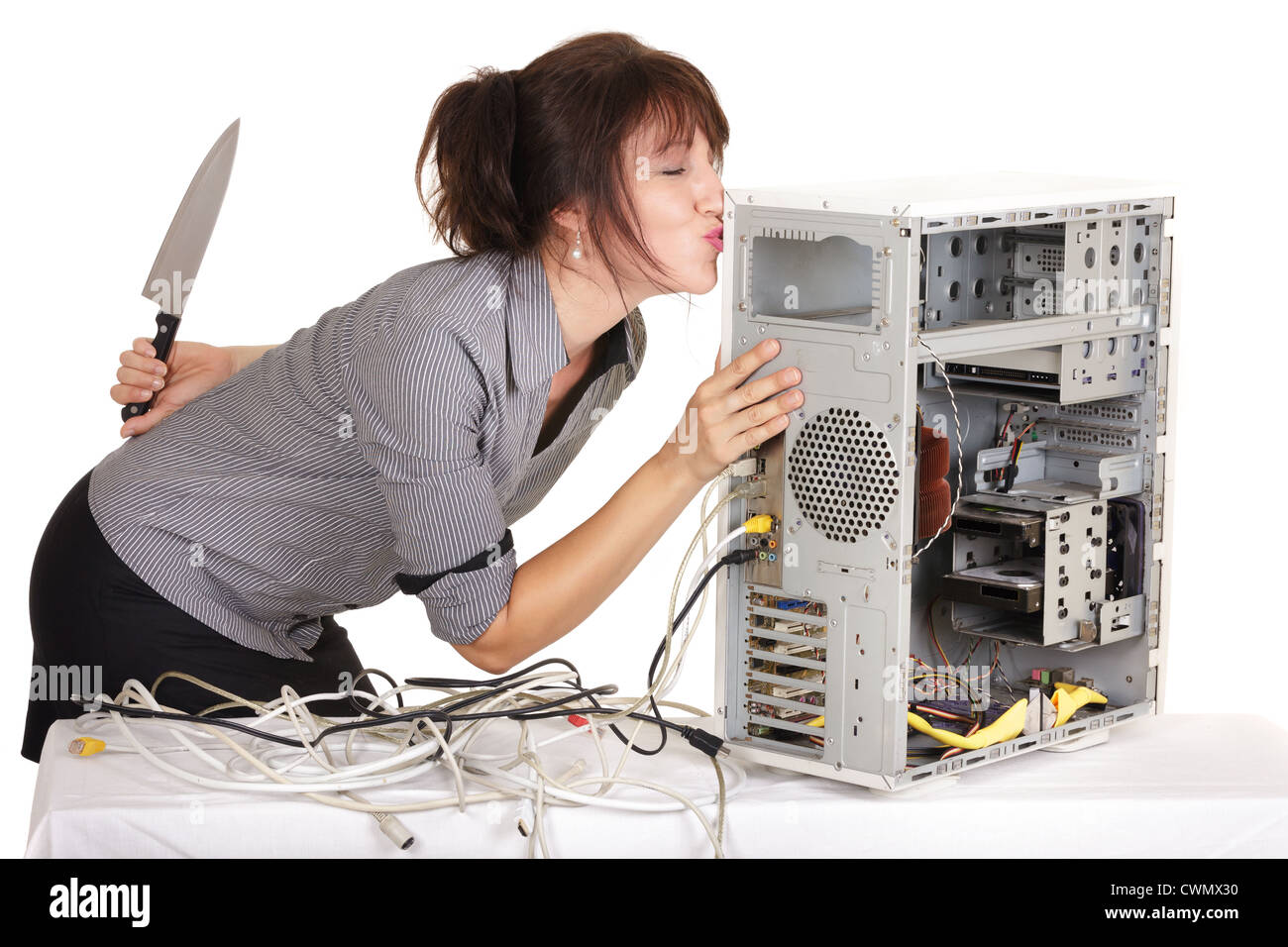 Business Woman kissing ordinateur avant d'avoir tué il Banque D'Images