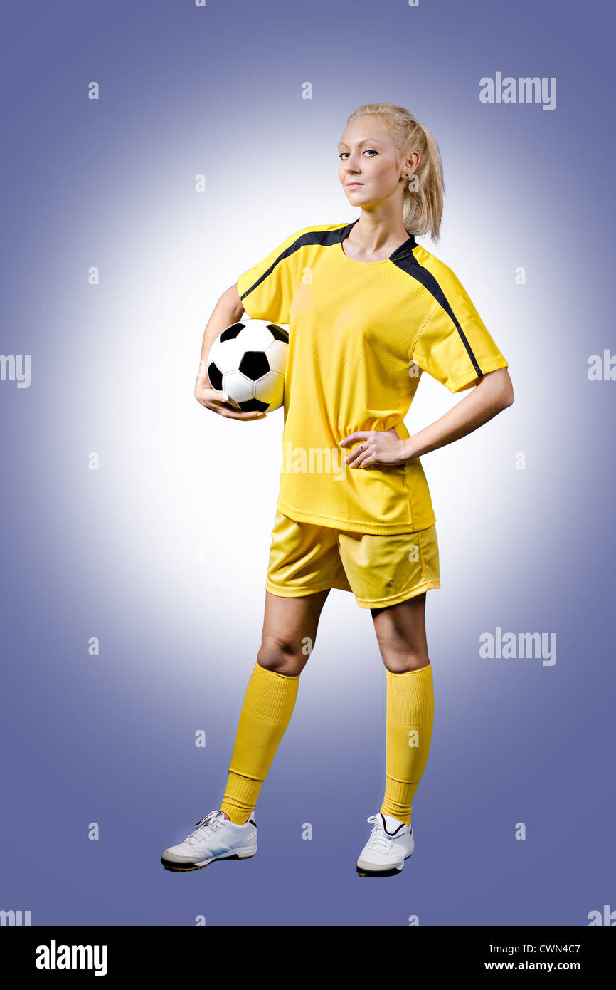 Le joueur de soccer féminin sur le terrain Banque D'Images