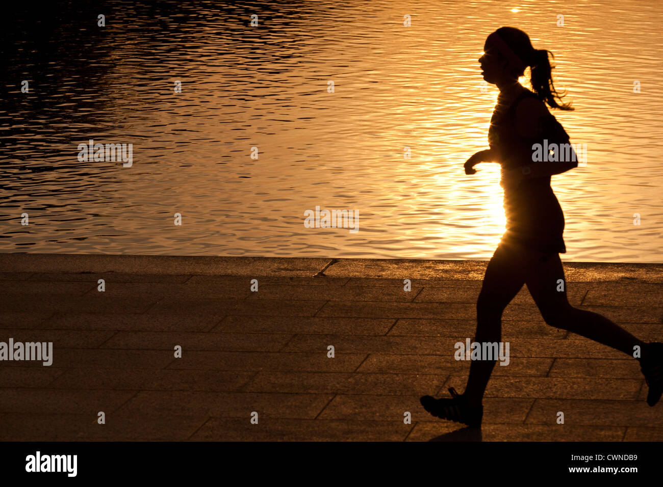 Tôt le matin, jogger silhouette - USA Banque D'Images