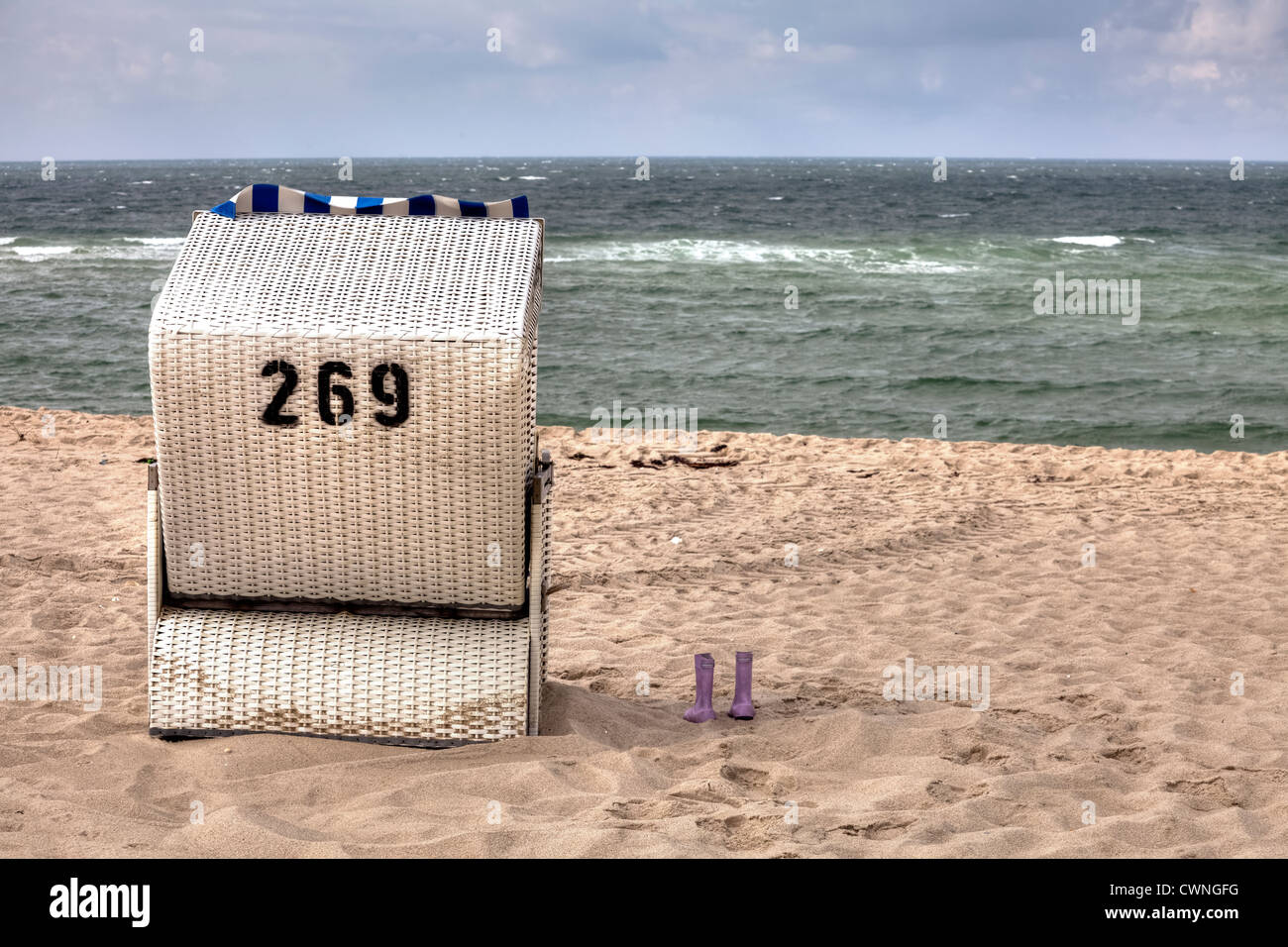 Chaise de plage, des bottes en caoutchouc, Sylt, Schleswig-Holstein, Allemagne Banque D'Images