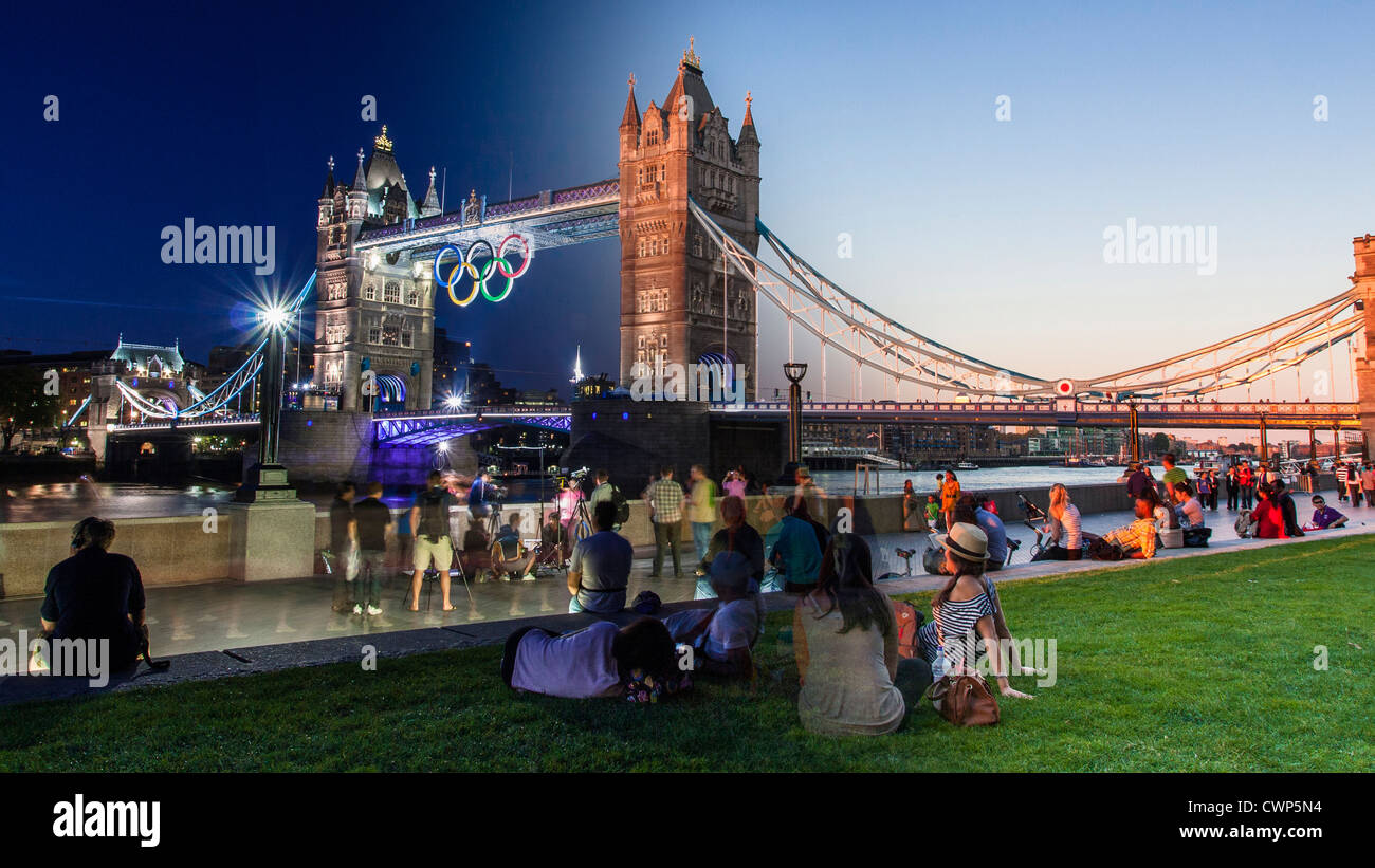 Londres - Circa 2Transition de la tombée de la nuit à Londres pour personnes à pied et profiter de la vue sur le pont de la tour avec les anneaux olympiques Banque D'Images