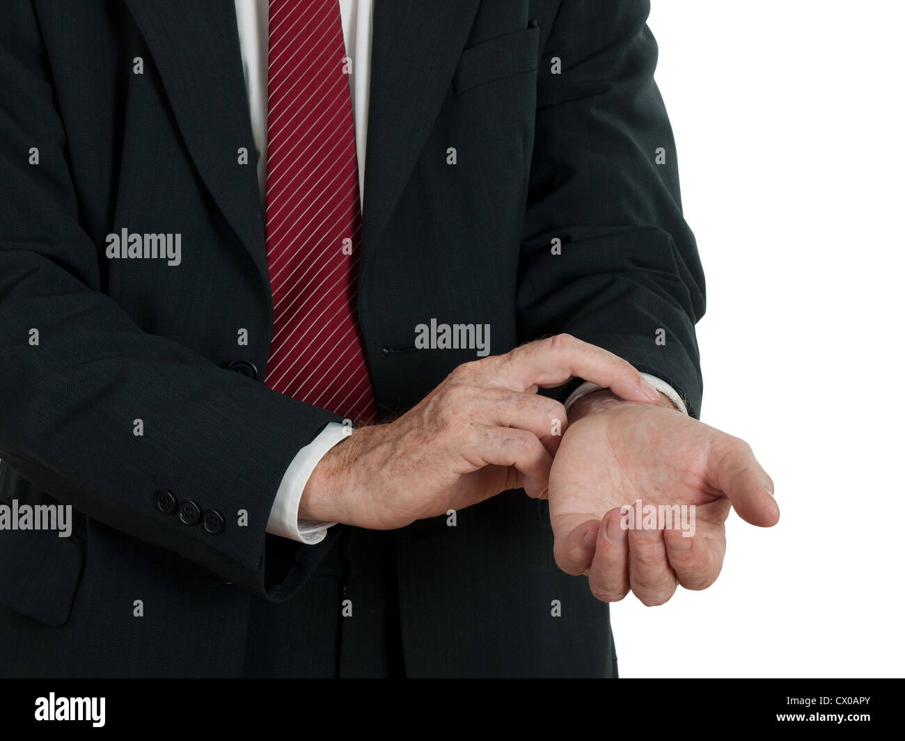L'homme en habit de prendre son propre pouls, fond blanc Photo Stock - Alamy