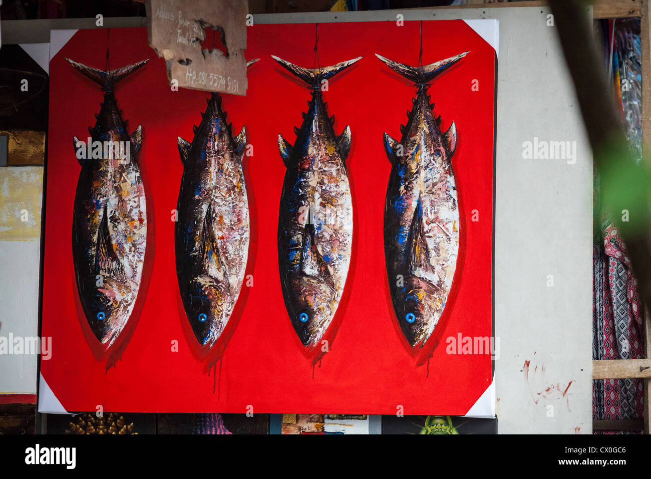 Vente de poissons montrant la peinture sur Bali Banque D'Images