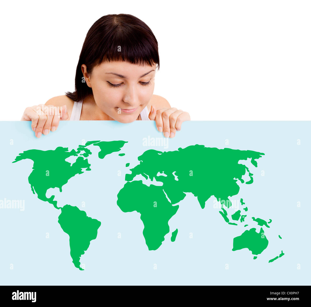 Woman smiling montrant earth globe sur billboard Banque D'Images