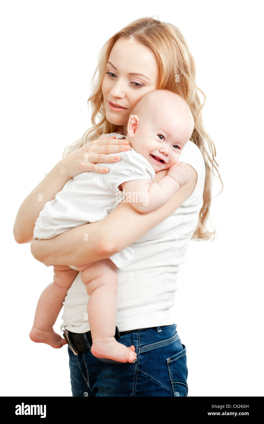 Jeune maman et bébé heureux dans ses mains Banque D'Images