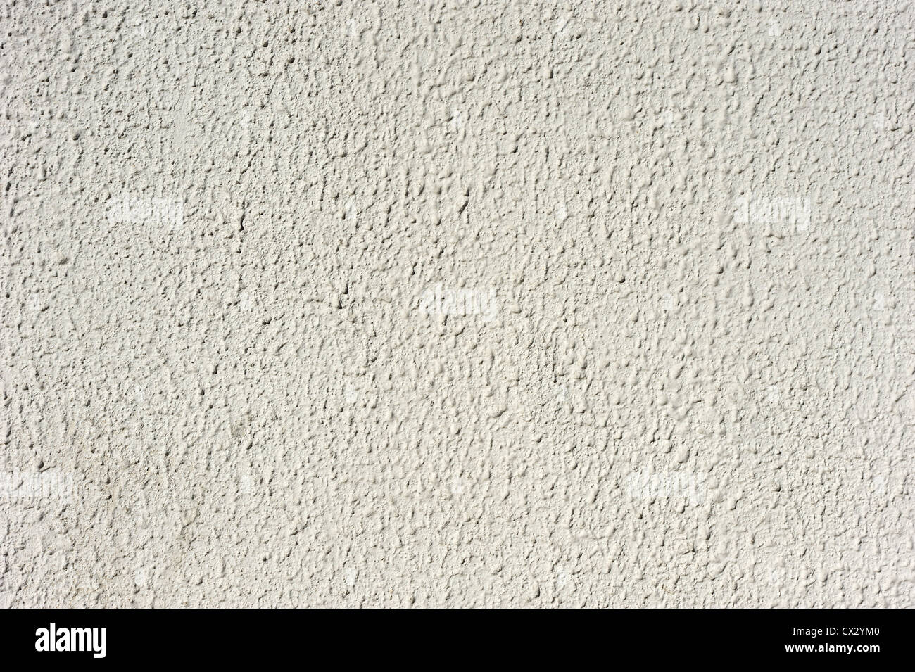 - Texture mur recouvert de plâtre gris clair. Banque D'Images