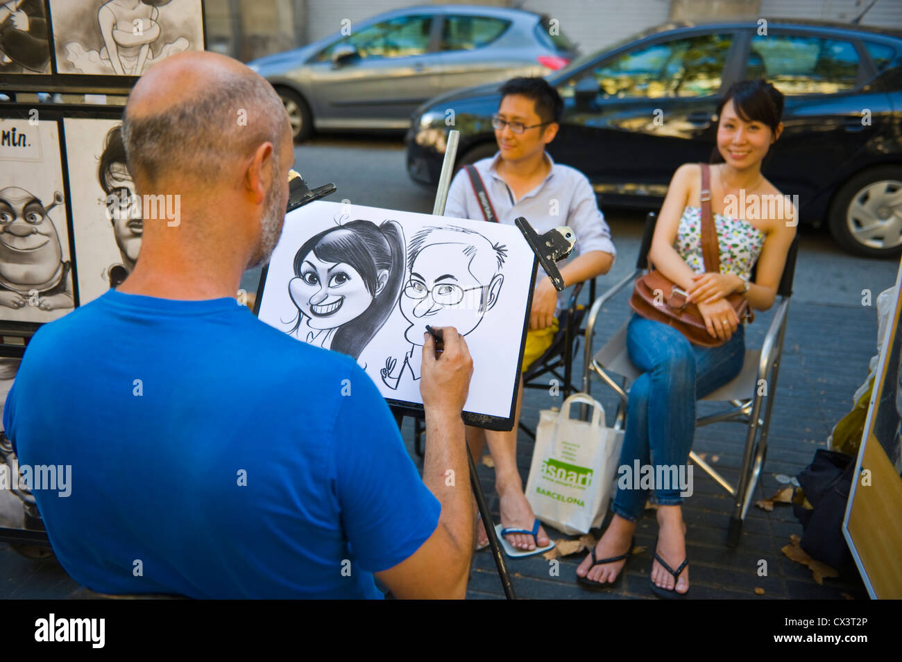 Barcelone ramblas. Les artistes de rue à dessiner les touristes sur Las Ramblas Barcelona La Catalogne Espagne ES Banque D'Images