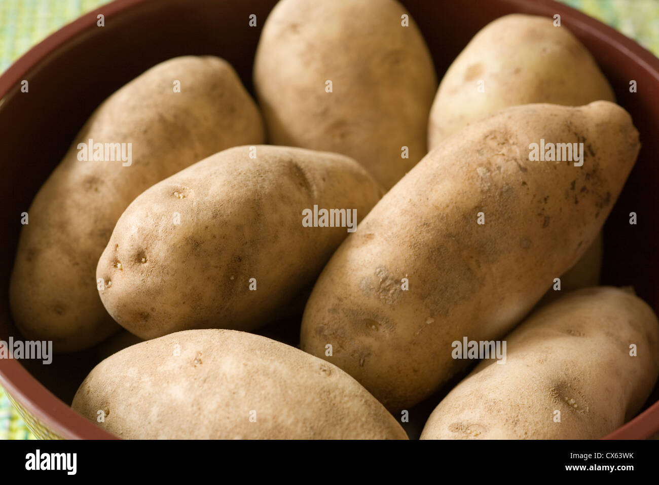 Ensemble, les matières, les pommes de terre roussâtres Banque D'Images