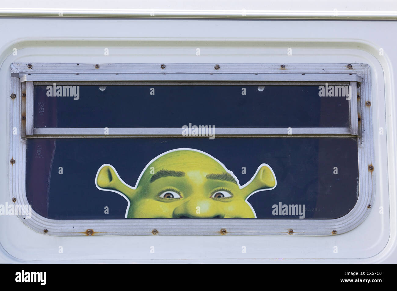 Autocollants de fenêtre sur une V W Camping-Van Shriek Banque D'Images