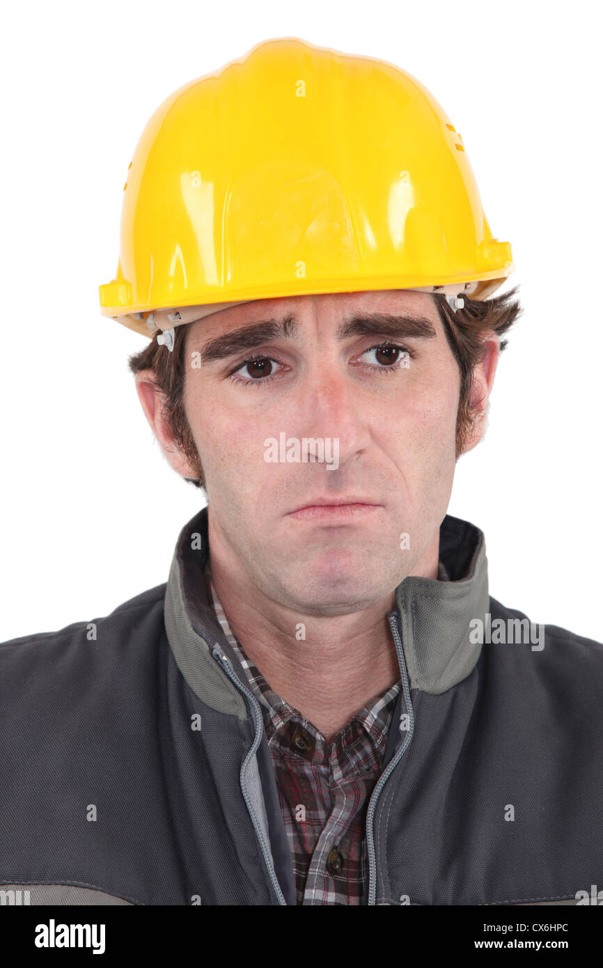 Une triste travailleur de la construction. Banque D'Images