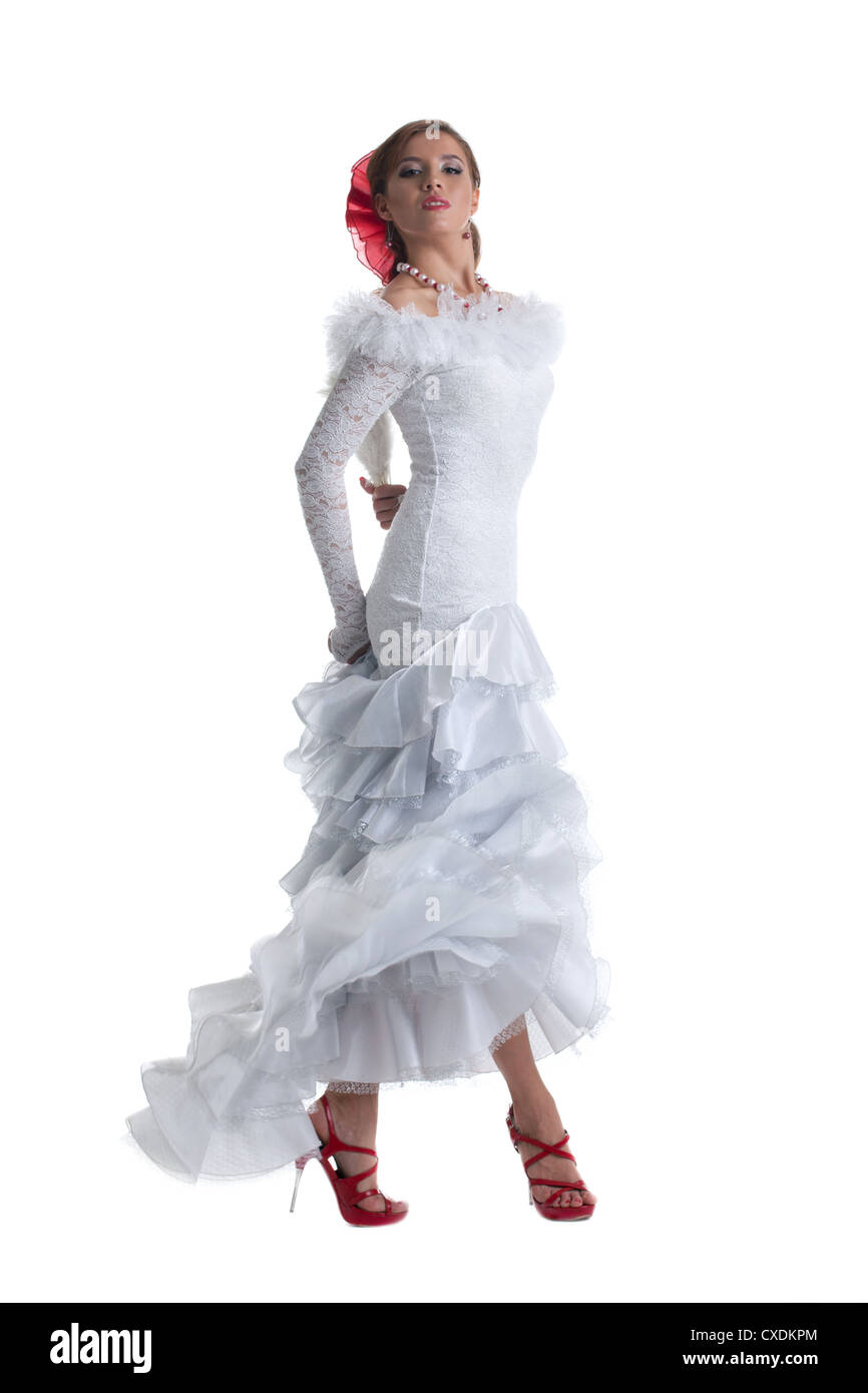 Jolie femme en robe blanche d'effectuer le flamenco Banque D'Images