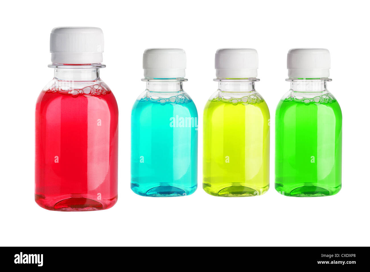 Laver la bouche multicolore dans des bouteilles en plastique sur fond blanc Banque D'Images