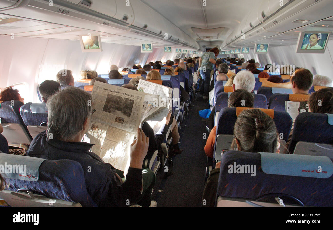 Berlin, les passagers dans une cabine de l'avion Banque D'Images