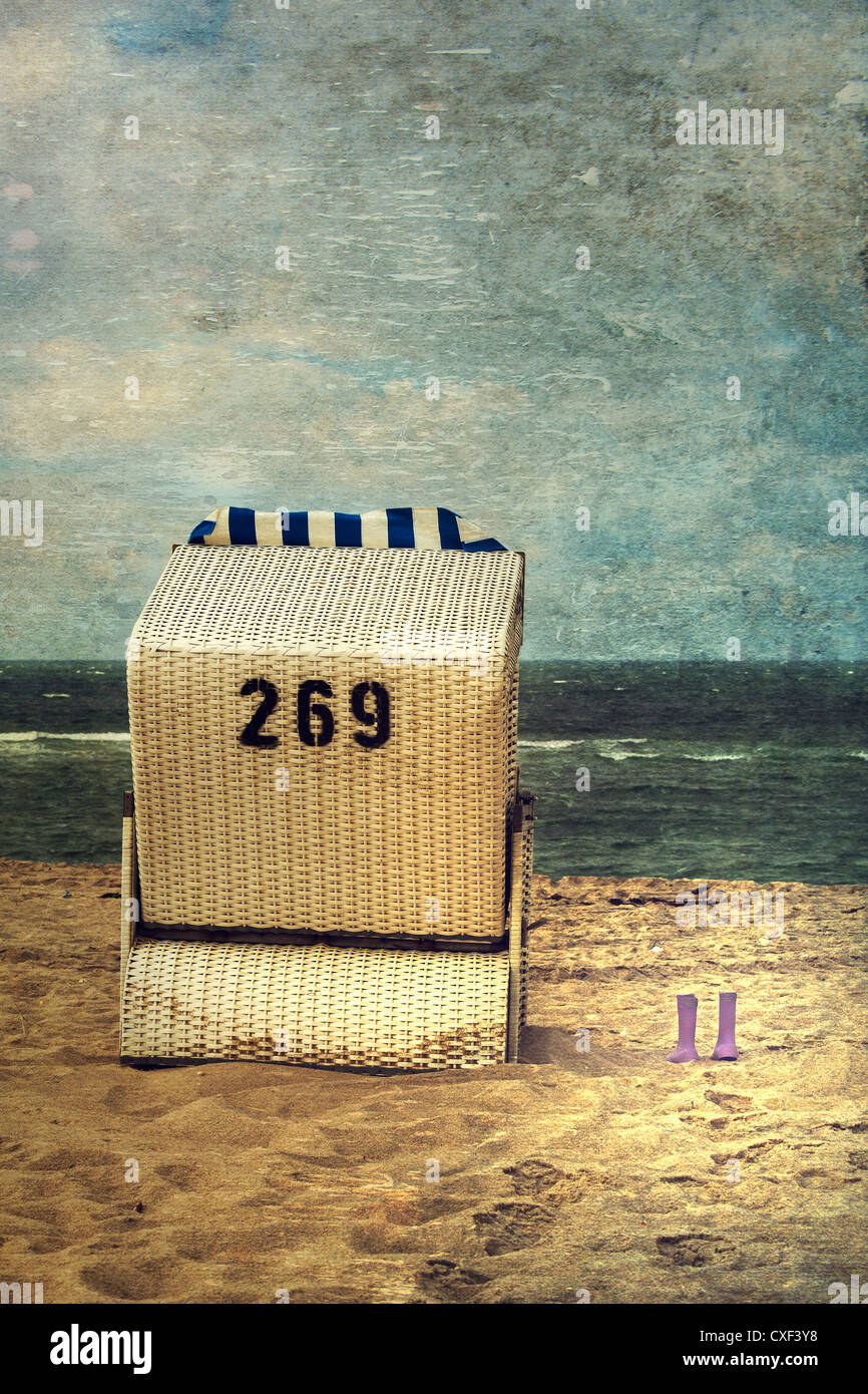 Une chaise de plage avec Wellington Banque D'Images