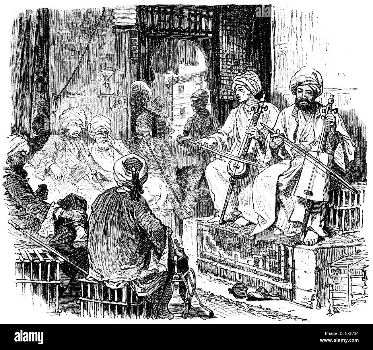 Musiciens avec instruments à cordes dans un café au Caire, Égypte, Banque D'Images