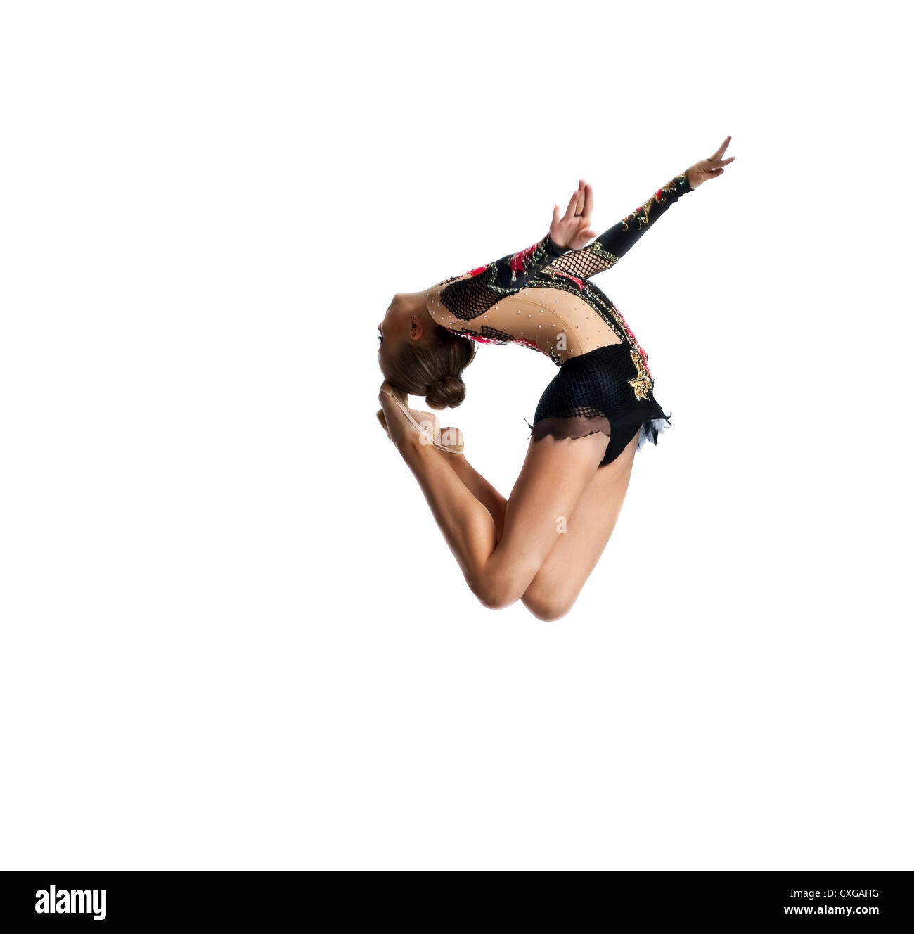 Jeune fille saute dans la danse gymnastique Banque D'Images