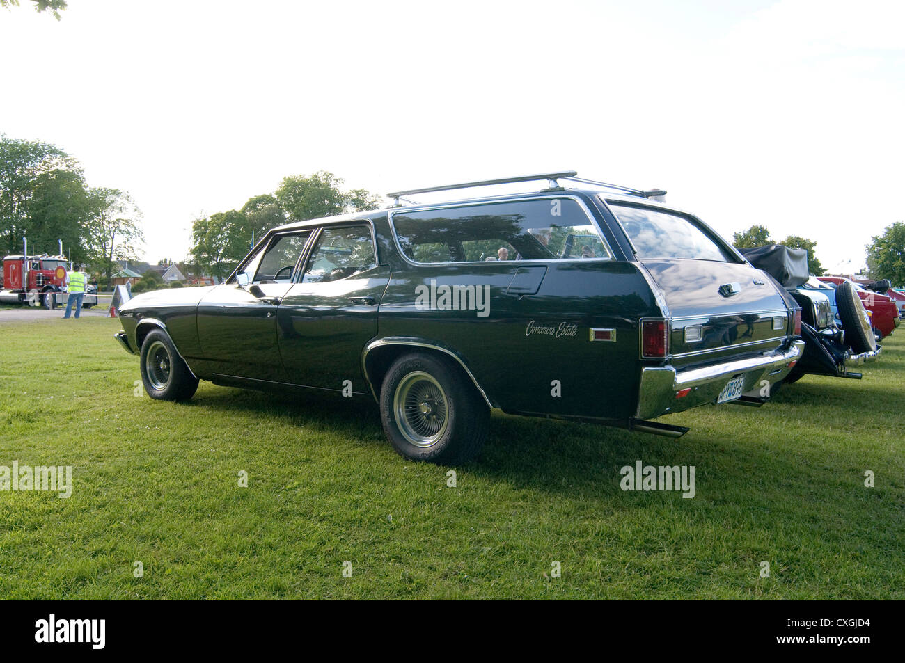 Station wagon wagons stationwagon stationwagons estate voiture voitures chevy Chevrolet Chevelle porte arrière hayon gating zigzague Banque D'Images