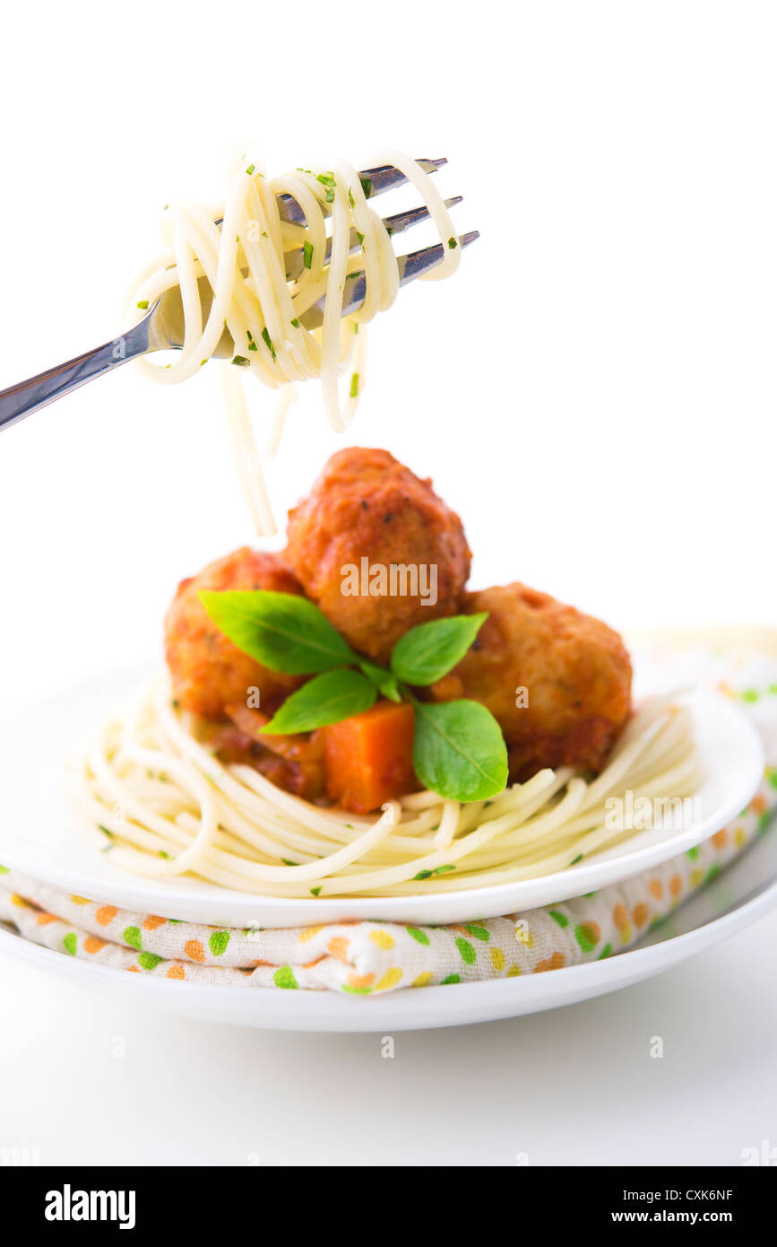 Délicieux sur une fourchette spaghetti close-up, spaghetti plaque en arrière-plan Banque D'Images