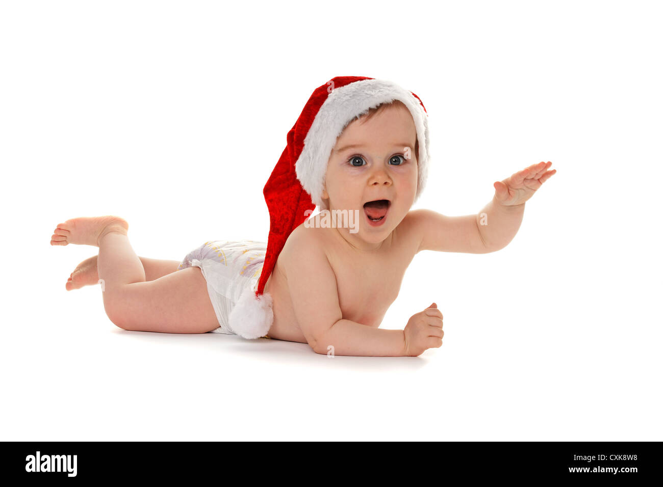 Petit bébé enfant avec Santa Claus hat Banque D'Images