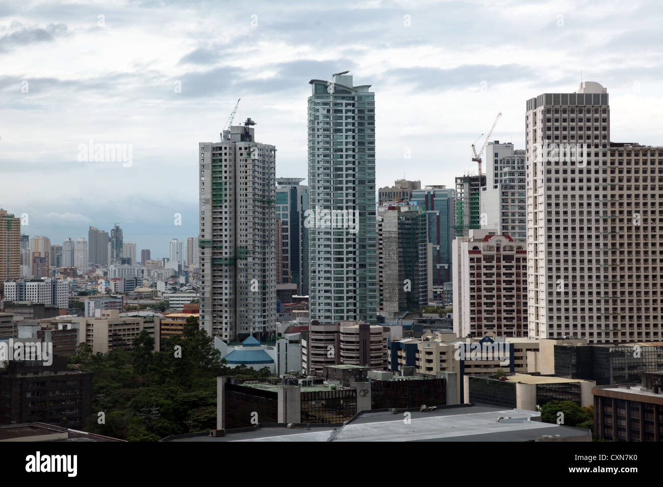 C'est une photo de Manille, la ville capitale de l'Philippines. Nous pouvons le l'horizon si ses affaires financial district towers Banque D'Images C'est une photo de Manille, la ville capitale de l'Philippines. Nous pouvons le l'horizon si ses affaires financial district towers Banque D'Images