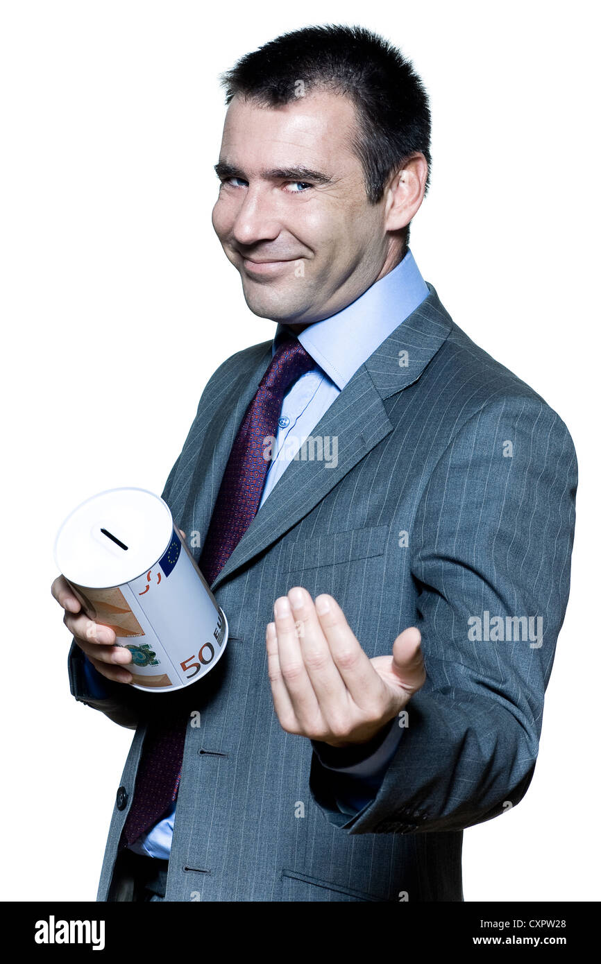 Portrait sur fond blanc isolé d'un smiling businessman holding une tirelire la mendicité pour l'argent Banque D'Images