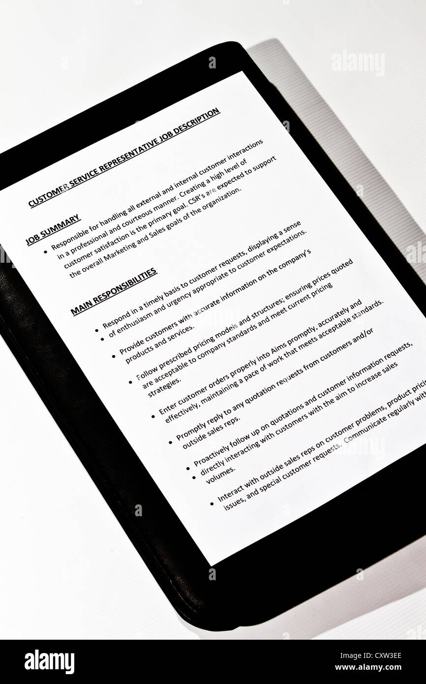 Description de l'emploi document sur un étui en cuir noir Banque D'Images