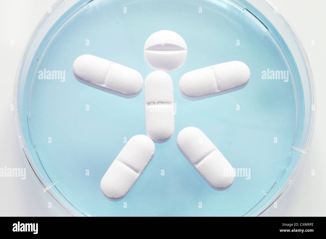 Close up of pills in stick figure forme Banque D'Images