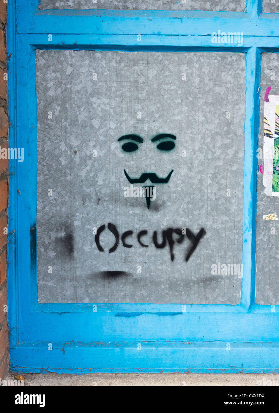 Logo graffiti occupent, UK Banque D'Images