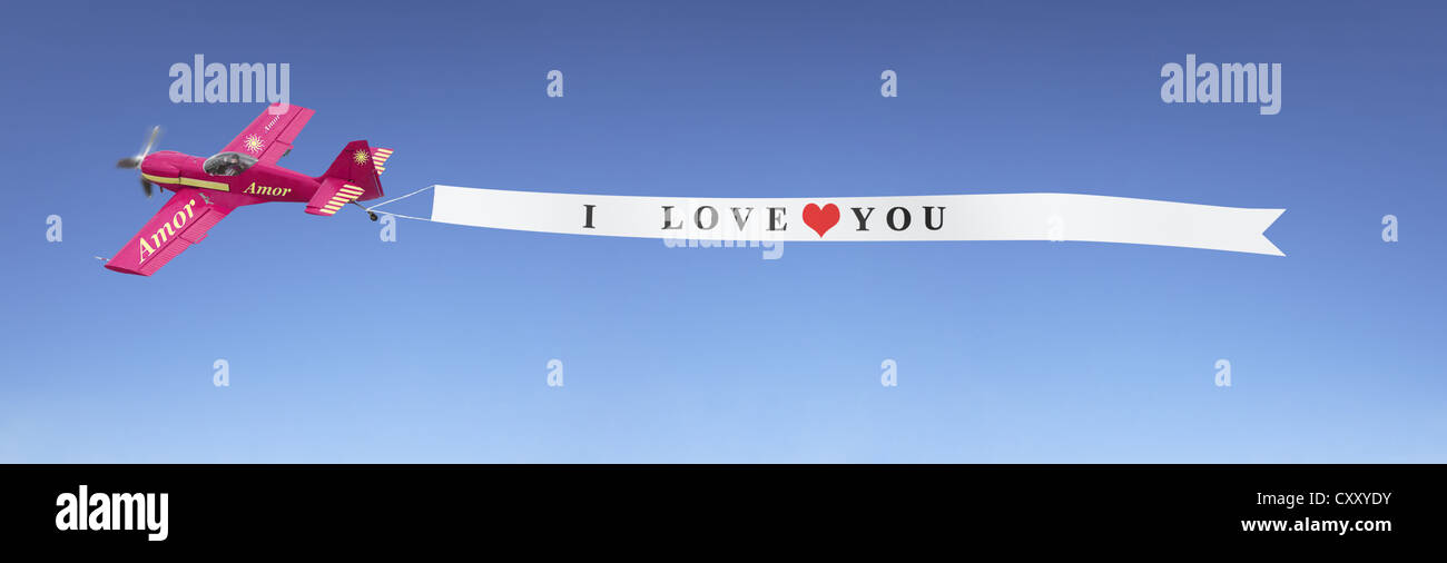 Avion dans le ciel tirant une bannière avec le message que je t