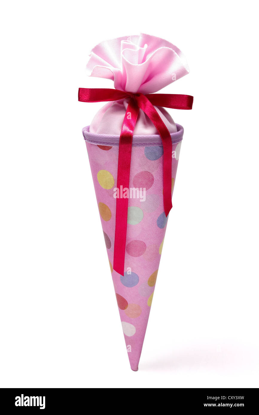 Schultuete ou cône rose école rempli de cadeaux et de bonbons Banque D'Images