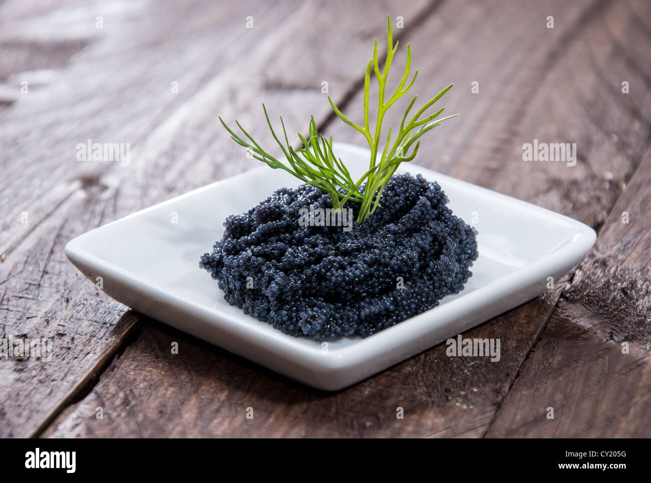 Petite partie de Black Caviar sur une plaque Banque D'Images