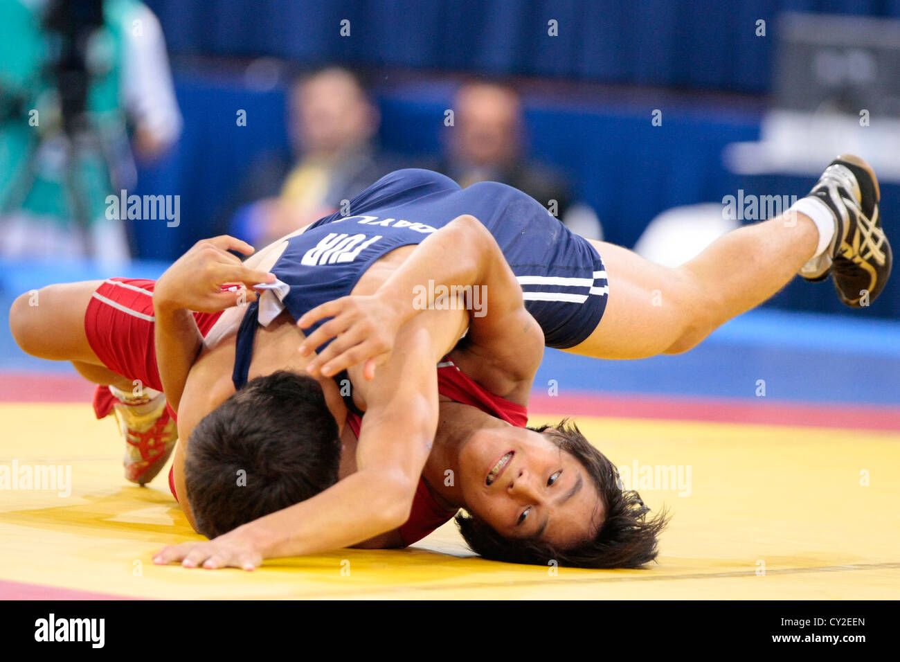 Jeux Olympiques de la jeunesse Singapour 2010 La lutte libre masculine (54KG) 3ème place playoffs Banque D'Images