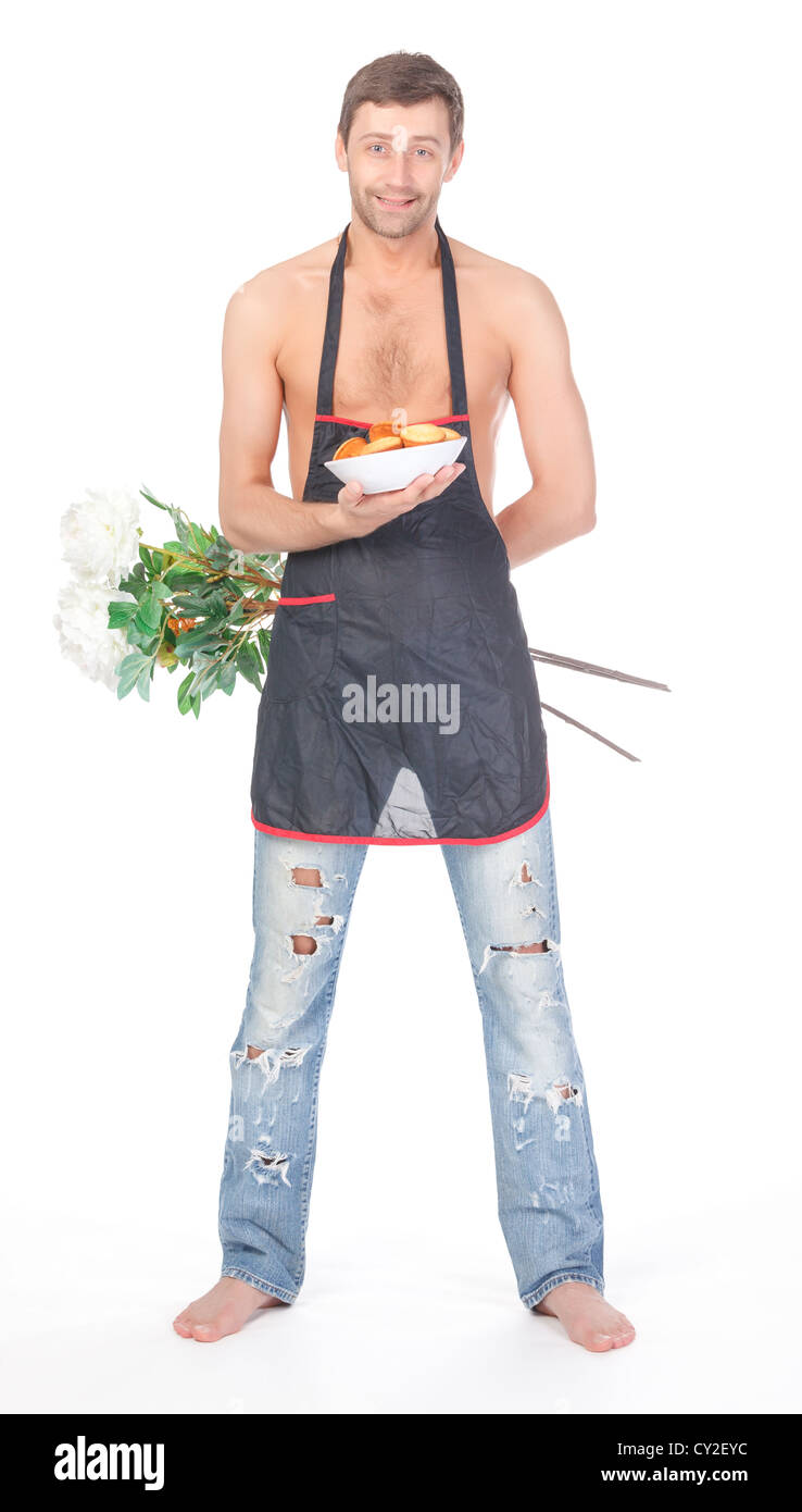 Bel homme torse nu pieds nus et en haillons jeans portant un tablier et de  transporter les fleurs et les cookies comme un cadeau d'anniversaire Photo  Stock - Alamy