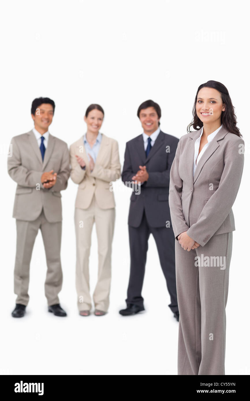 Businesswoman getting applause de ses collègues Banque D'Images