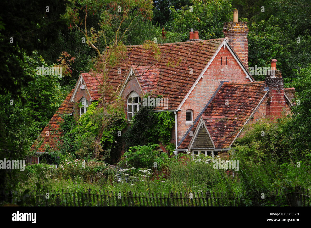 Une brique cottage dans le village de Wimborne Dorset UK St Giles Banque D'Images