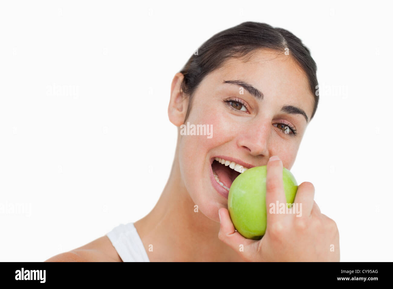 Close-up une brunette eating apple Banque D'Images