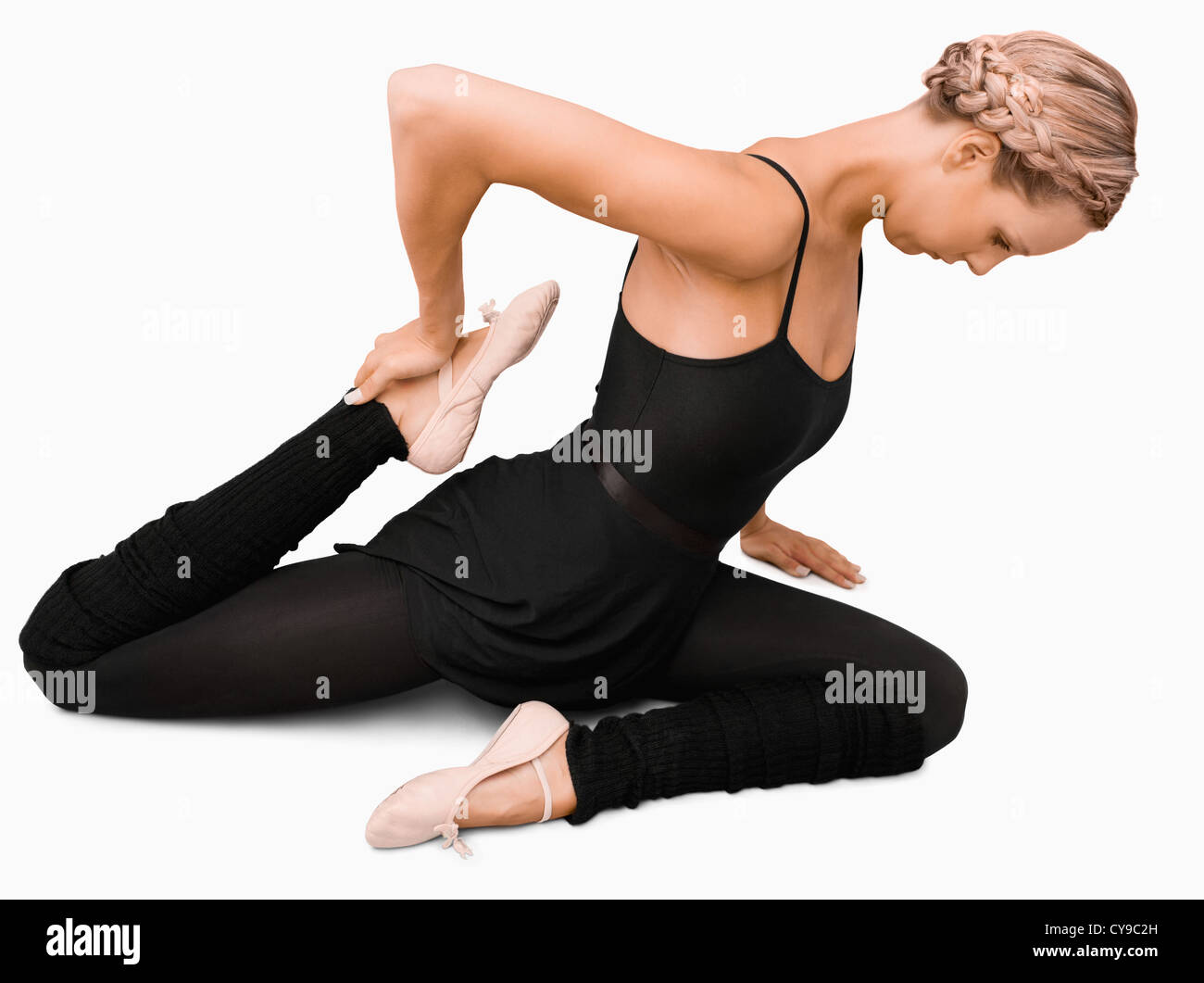 Vue latérale du stretching femme Banque D'Images