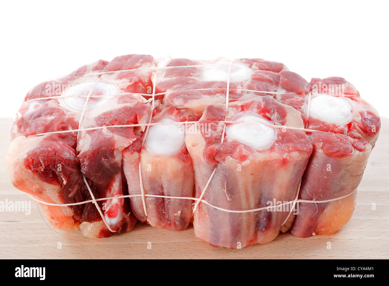 Queue de boeuf Le boeuf dans une planche à découper Banque D'Images